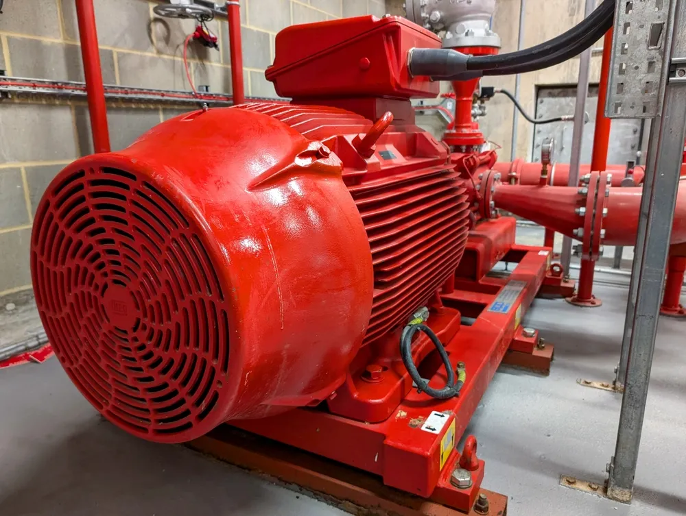 A,Close-up,View,Of,A,Large,Industrial,Fire,Pump,Motor